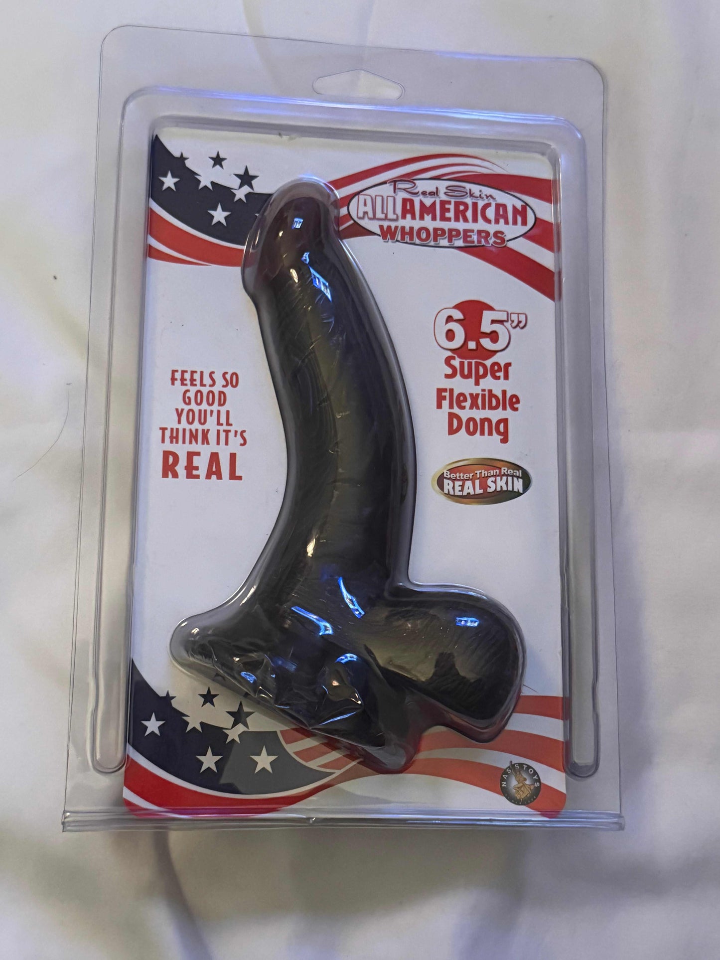 Real Skin All American Whoppers 6.5-inch black flexible dildo with suction cup base in retail packaging